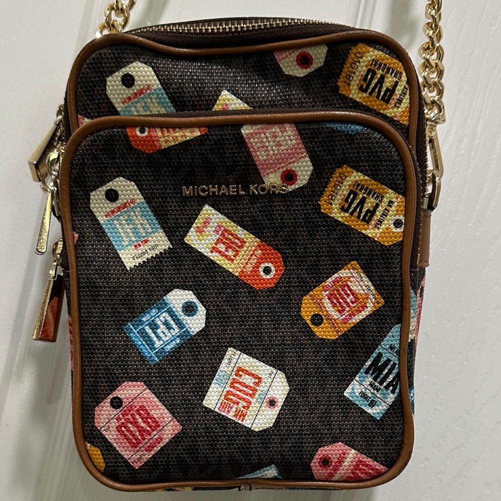 Michael Kors Brown travel Tag-Print Crossbody Bag with Gold Chain